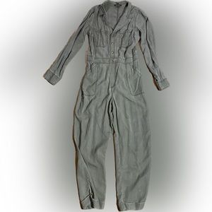 Military green jump suit.